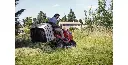 HF Ride On Mower Model Dumping Grass.webp
